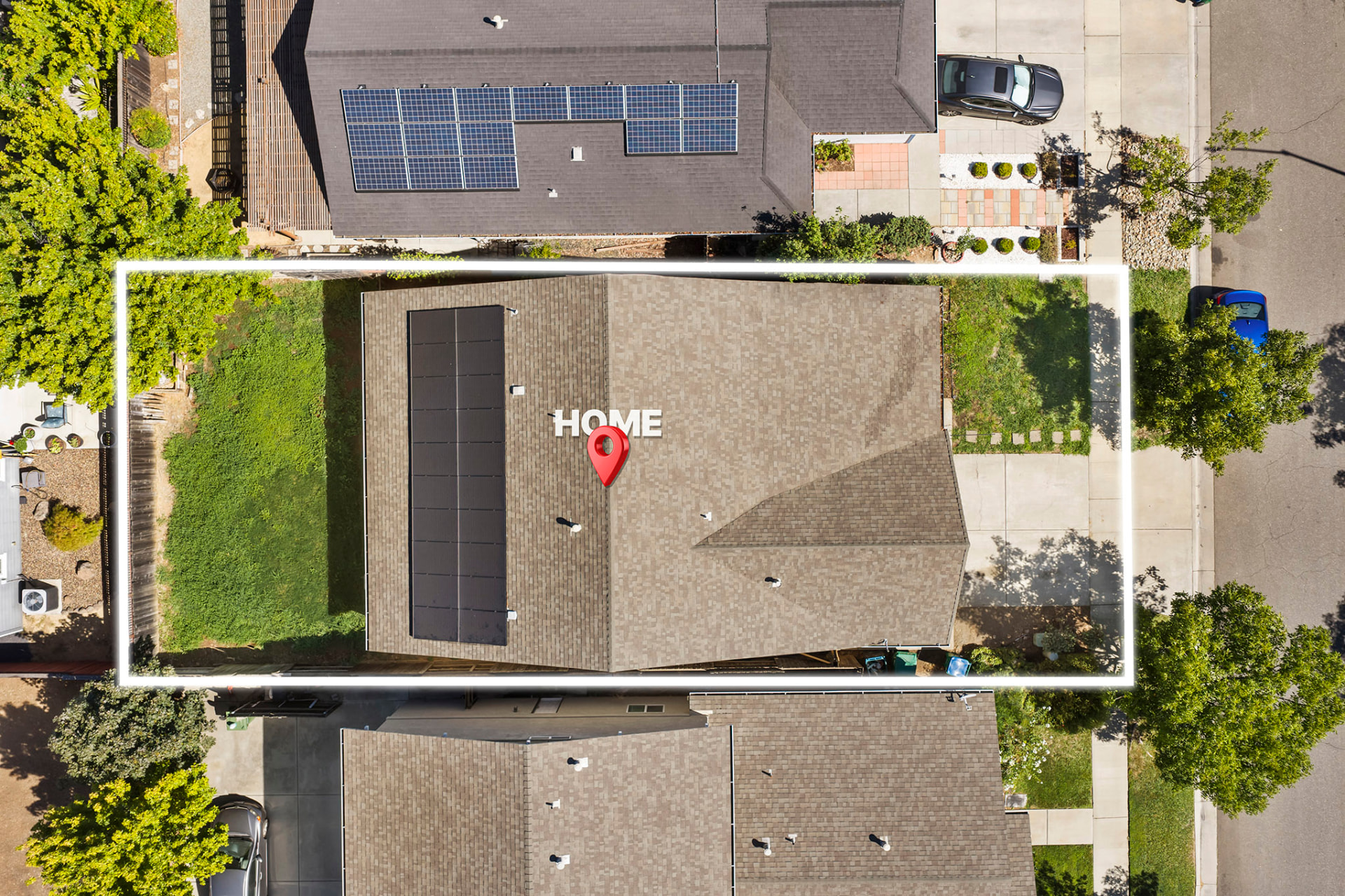 Overhead drone view of the lot and surrounding street
